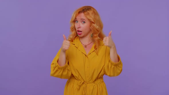 Redhead Stylish Girl in Yellow Dress Showing Thumbs Up and Nodding in Approval Successful Good Work