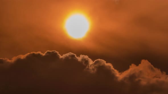 220508_Time lapse of dramatic sunset with orange sky in a sunny day. alt