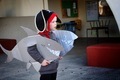 Boy dressed up in a homemade shark costume at a school event - PhotoDune Item for Sale