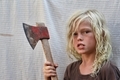 Boy holding an axe, making a scary face - PhotoDune Item for Sale