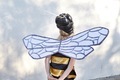 Girl in a bee costume from behind - PhotoDune Item for Sale