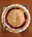 Wild blueberry homemade pie cooling on trivet - PhotoDune Item for Sale