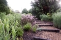 A garden path leading upwards through lush landscape  - PhotoDune Item for Sale