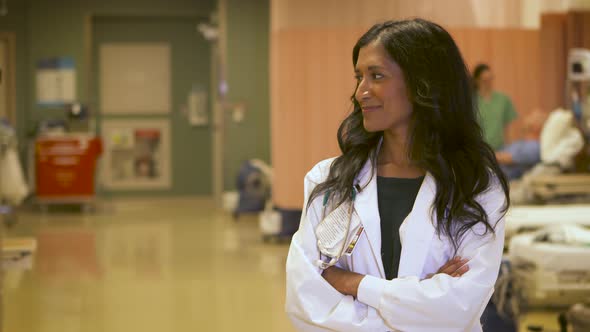 Portrait of a confident female Doctor and Nurse smiling at camera.