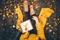 Woman with notebook at the autumn park. - PhotoDune Item for Sale