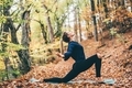Woman doing yoga at the autumn forest. - PhotoDune Item for Sale