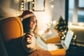 Woman celebrating Christmas online. - PhotoDune Item for Sale