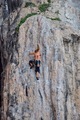 Extreme sports on display as a rock climber scales a cliff face  - PhotoDune Item for Sale