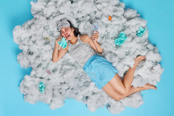 s shortness of breathing has runny nose takes pills to relieve fever suffers from allergy dressed in casual domestic clothes lies on fluffy cloud