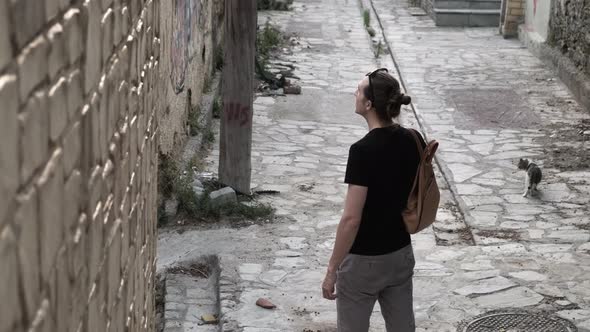 Man Exploring Old City Streets