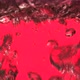 Boiling water close up on red background. 4K UHD video - VideoHive Item for Sale