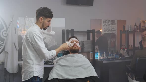 Hipster Male Client Visiting Modern Barber Shop