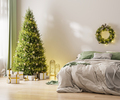 Christmas three with ornaments, festive lights and white and golden gift boxes in room interior  - PhotoDune Item for Sale
