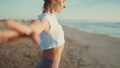 Beautiful woman with slim body enjoying morning yoga practice on the beach - PhotoDune Item for Sale