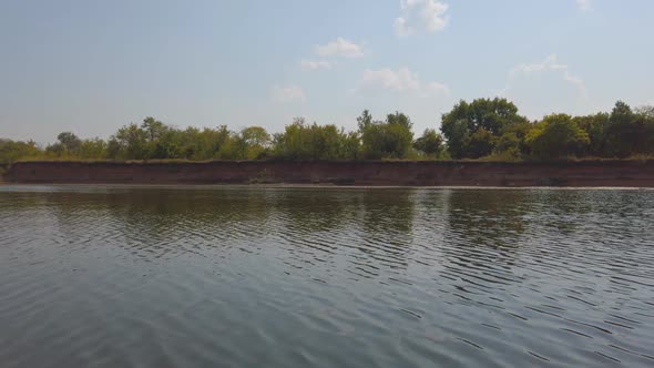 View of the Steep Bank From the Water