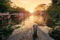 Alleppey backwaters with local boat on sunrise - PhotoDune Item for Sale
