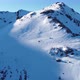 Drone view of solo mountaineer hiking during winter - VideoHive Item for Sale
