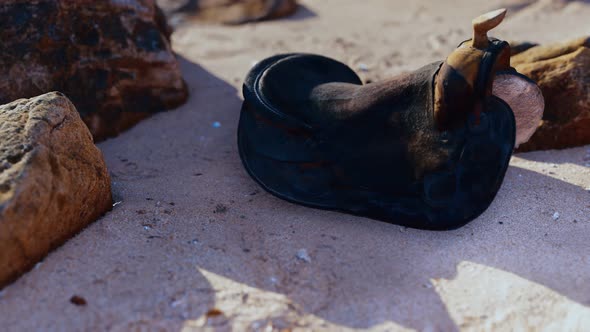 Old Horse Saddle on Sand Beach