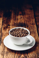 Roasted coffee beans in white cup - PhotoDune Item for Sale