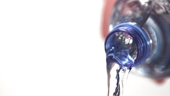 Super Slow Motion From the Bottle Pours a Stream of Water