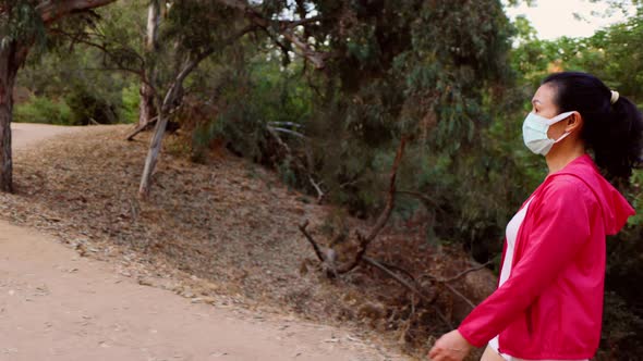 Asian woman going for a hike