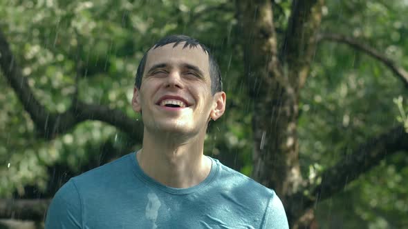 Happy Man Under Summer Rain