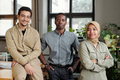 Group of three young multicultural employees in casual attire - PhotoDune Item for Sale