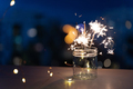 Sparklers on New Year's Eve with city background - PhotoDune Item for Sale