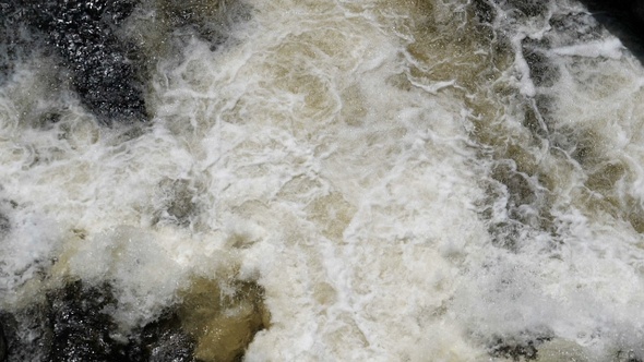 Turbulent water in the river