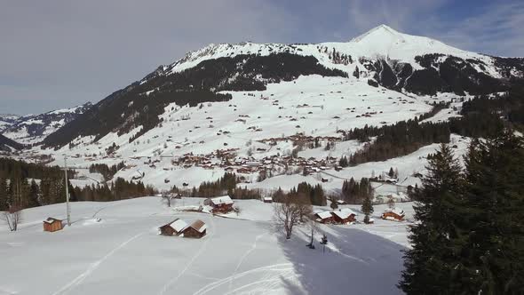 Aerial of houses in a valley, Gstaad