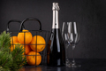 Basket with oranges, champagne and fir tree branch - PhotoDune Item for Sale