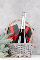 Basket with Christmas gift boxes, champagne - PhotoDune Item for Sale