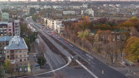 Aerial View with Road Traffic Skyscape Day to Night Timelapse