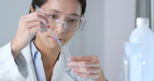 Woman Scientist Working in Laboratory