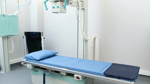 Empty operating room with x-ray machine