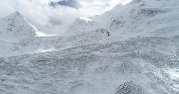 Flying drone approaching fossil glacier in tibet, China