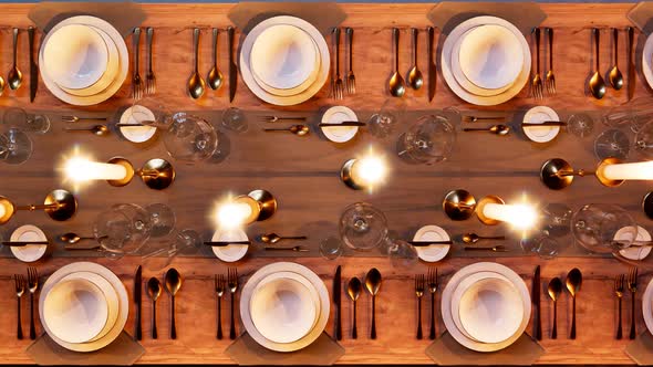 Elegant tableware at the restaurant. Dinner set at the reception. Candles light.