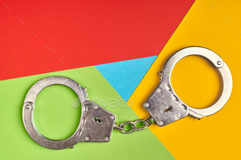 r criminal caught concept. Red, yellow, green and blue colors. Colorful and bright logo