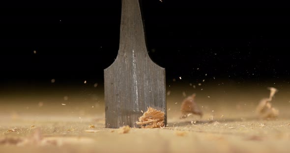Wood Chip Turning on a Wood Board, Making Chips, Slow Motion 4K
