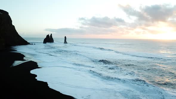 Black Sand Beach Sea Stacks Iceland aerial drone 4k