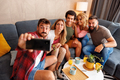 Friends having fun taking selfie at home - PhotoDune Item for Sale