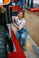 Portrait of mechanic woman repairing motorcycle on factory - PhotoDune Item for Sale