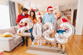 Family holding giant balloons shaped as numbers 2023 while having New Year party - PhotoDune Item for Sale