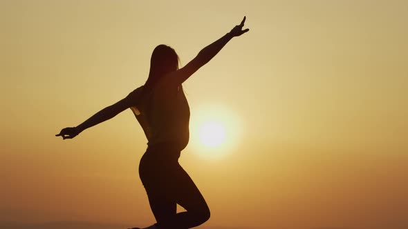 Woman dancing in the evening