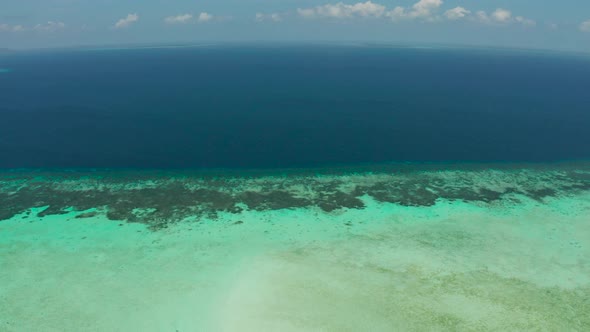 Seascape with Coral Reef and Atoll in the Blue Sea Balabac Palawan Philippines