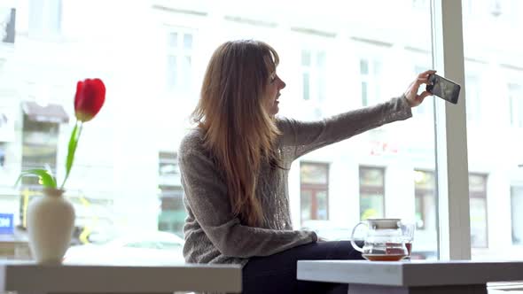 Woman Making Selfie in Cofeeshop