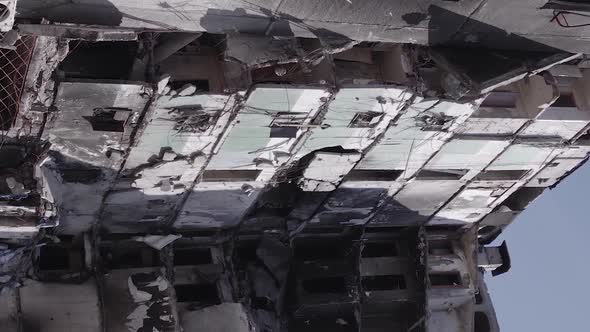 Vertical Video of the Consequences of the War in Ukraine  a Destroyed Building