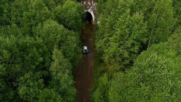 Aerial View of the Car Entering the Tunnel