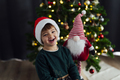 Happy child with Santa Claus hat laughing - PhotoDune Item for Sale