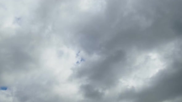 Gray Rain Clouds Are Moving in the Sky. TimeLapse